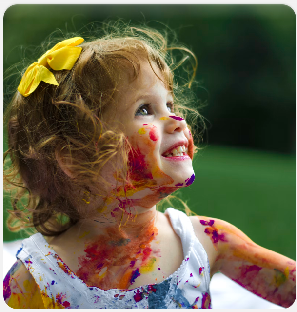 Smiling child with painted face