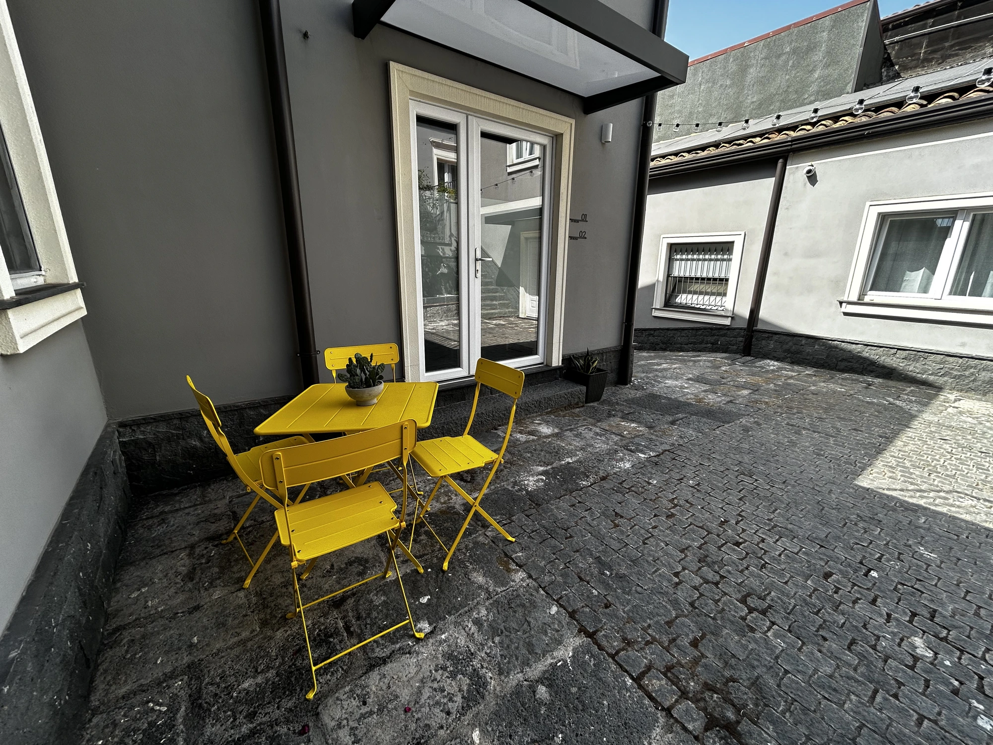 Yellow table courtyard