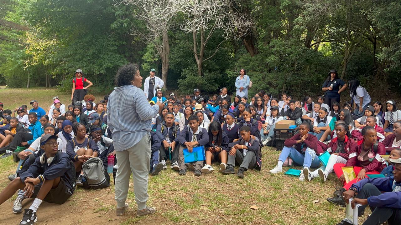 Briefing under the trees