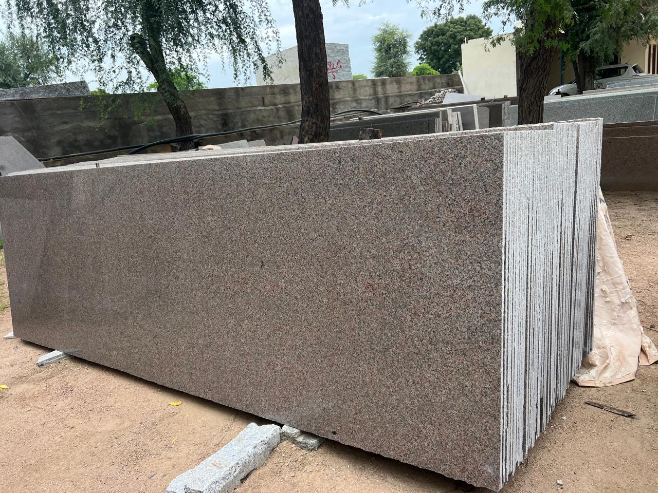 Arjun Granites premium red granite slab