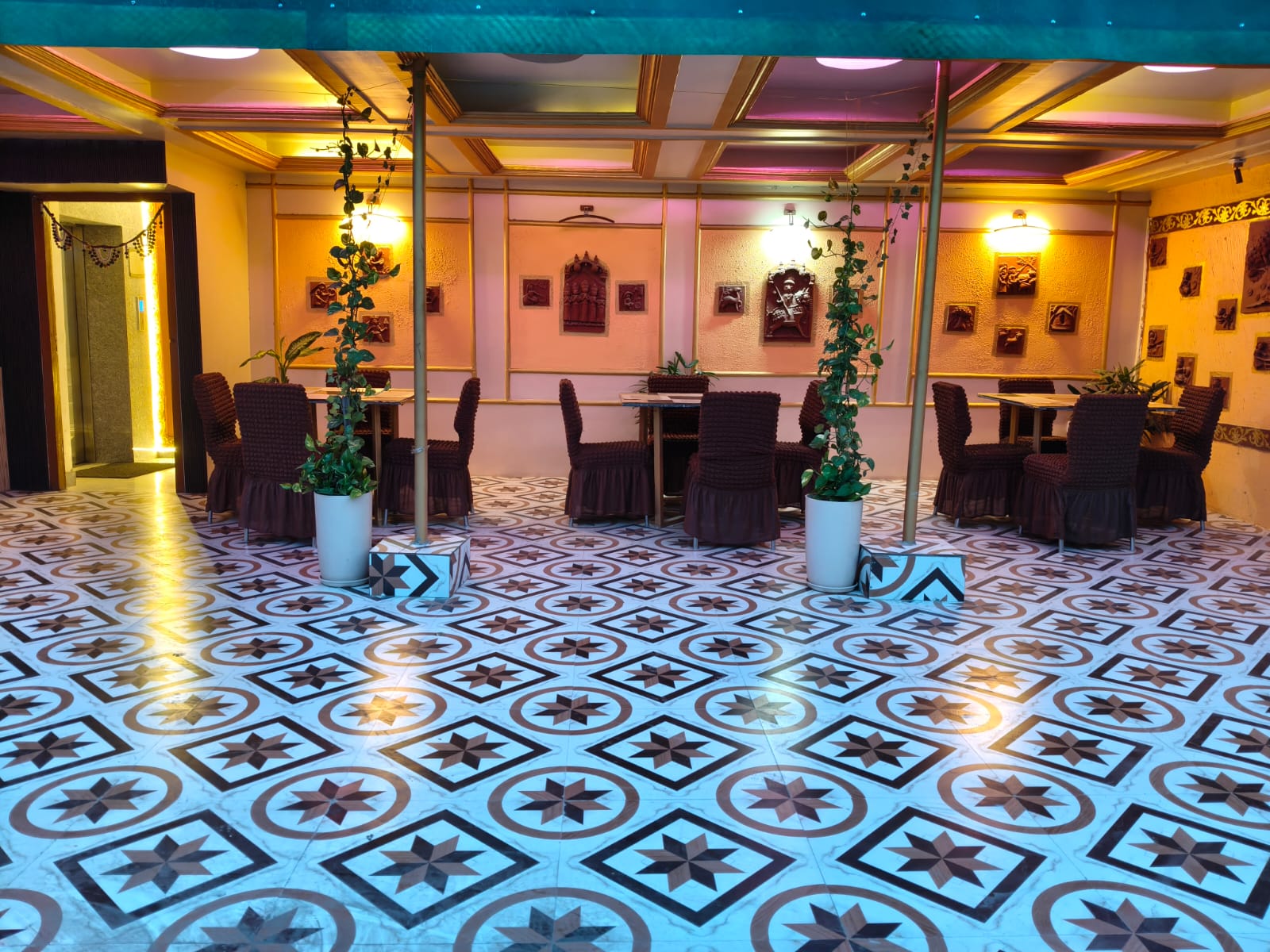 ROOFTOPz Botanical restaurant with terracotta heritage wall art, Patna