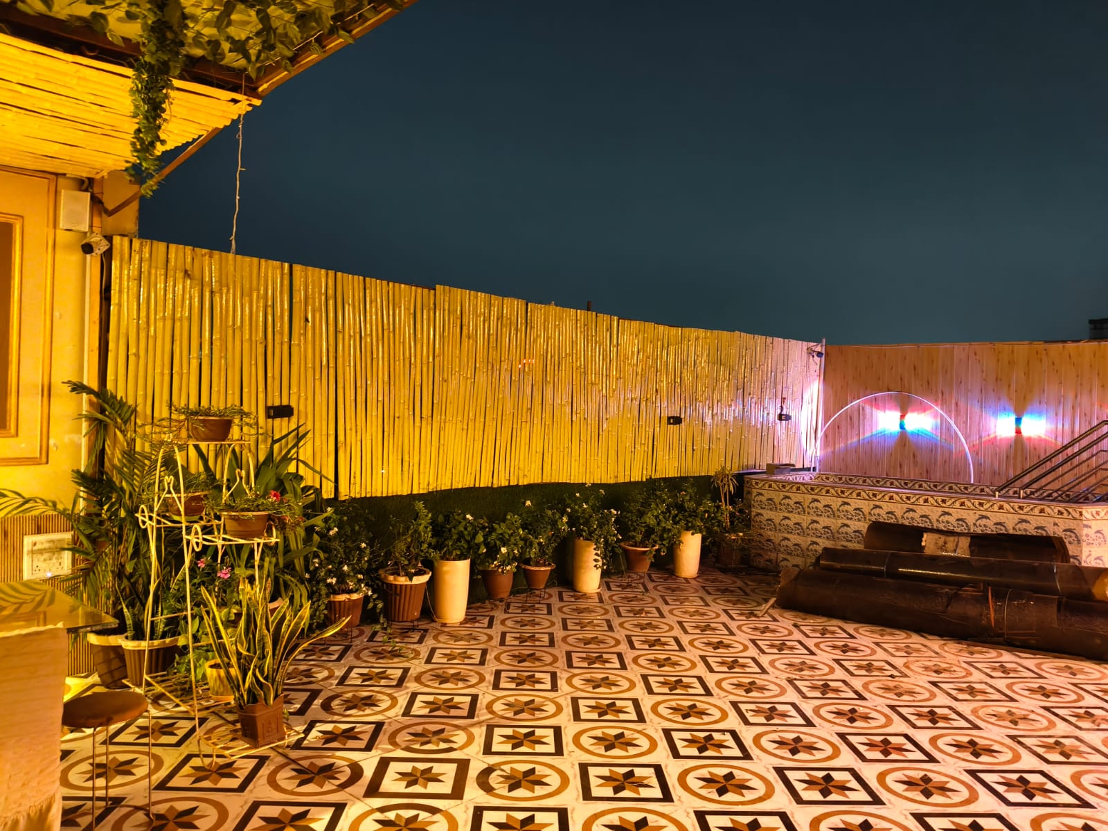Rooftop restaurant evening ambiance at Hotel Virasat Retreat, Patna