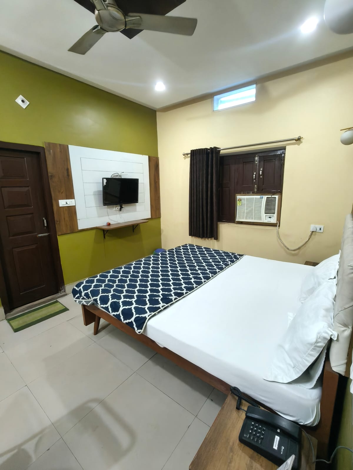 Spacious AC Premium room with king bed at Hotel Virasat Retreat, Patna