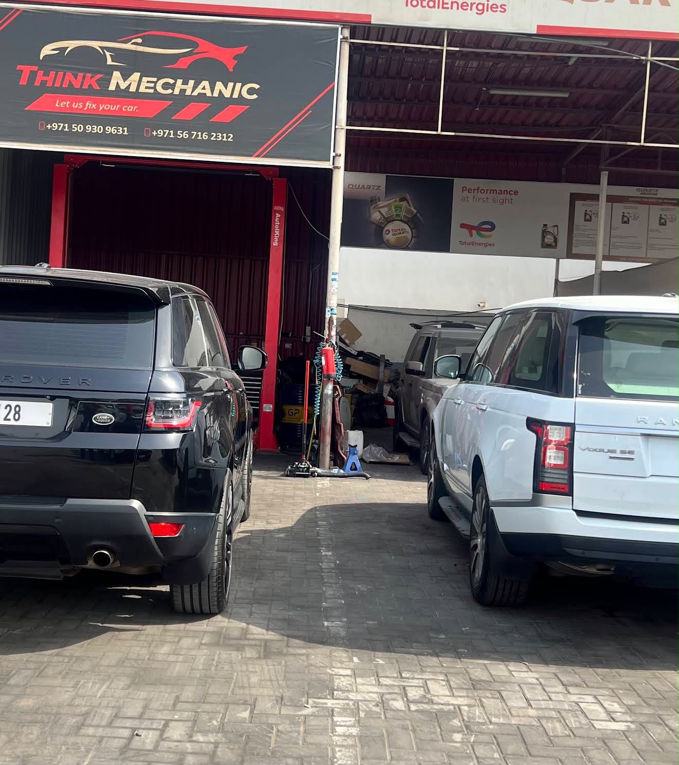 Multiple Mercedes C-Class vehicles being serviced