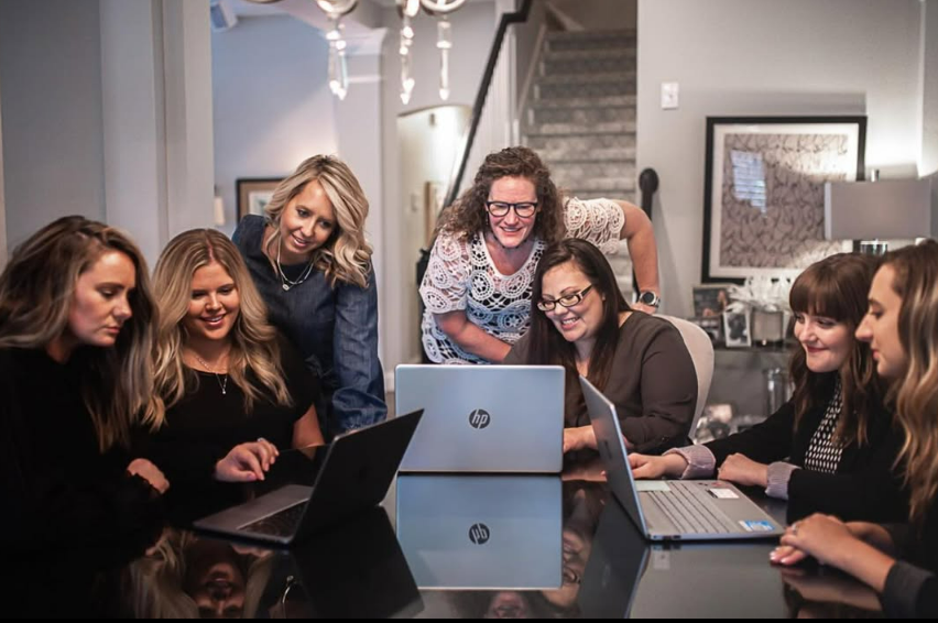 The Mom's Best Friend team, led by our owner, with our nannies and coordinators